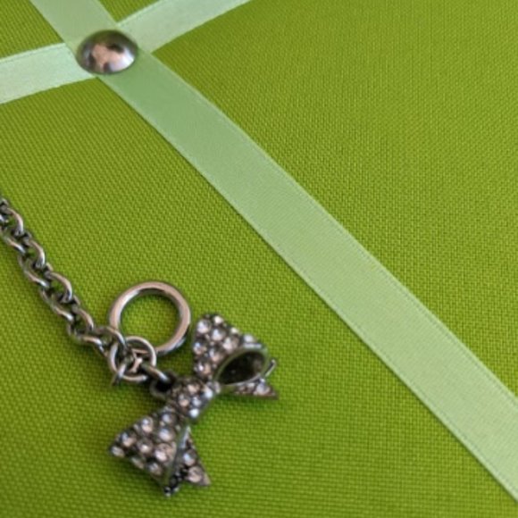 Juicy Couture Silvertone Zircon Bow Charm Bracelet - Picture 3 of 6